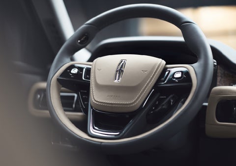 The intuitively placed controls of the steering wheel on a 2024 Lincoln Aviator® SUV | Dave Sinclair Lincoln St. Peters in Saint Peters MO