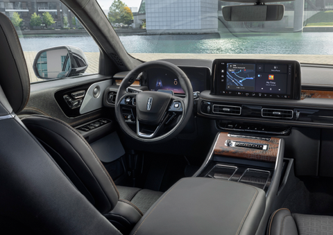 The interior of the 2025 Lincoln Aviator® SUV is shown parked with a view of a harbor through the windshield. | Dave Sinclair Lincoln St. Peters in Saint Peters MO