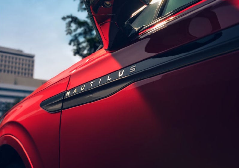 A side badge on the passenger door reads Nautilus. | Dave Sinclair Lincoln St. Peters in Saint Peters MO