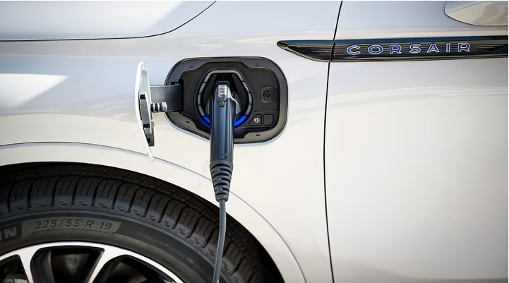 An electric charger is shown plugged into the charging port of a Lincoln Corsair® Grand Touring
model. | Dave Sinclair Lincoln St. Peters in Saint Peters MO