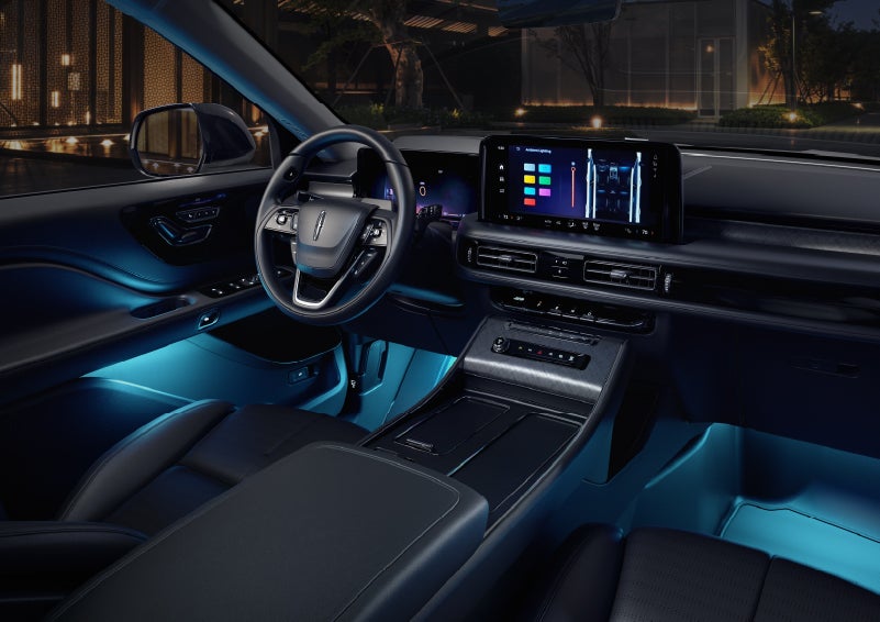 Deep blue ambient lighting glows from various places within a 2026 Lincoln Aviator® SUV. | Dave Sinclair Lincoln St. Peters in Saint Peters MO
