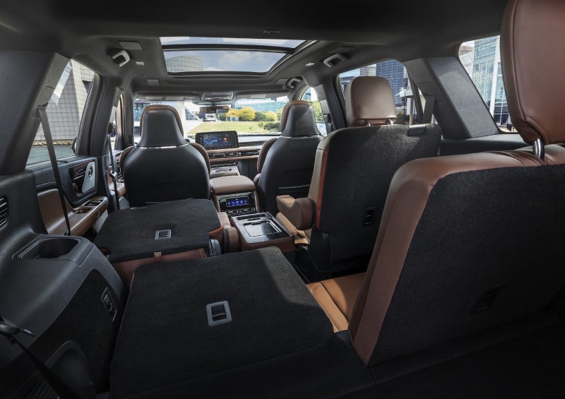 One side of the PowerFold® third-row seat and a second-row seat are folded forward in the 2026 Lincoln Aviator® SUV. | Dave Sinclair Lincoln St. Peters in Saint Peters MO