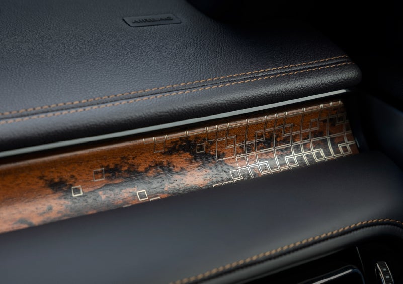 A close-up shot of the 2026 Lincoln Aviator® dashboard with unique black and brown accents and brown stitching. | Dave Sinclair Lincoln St. Peters in Saint Peters MO