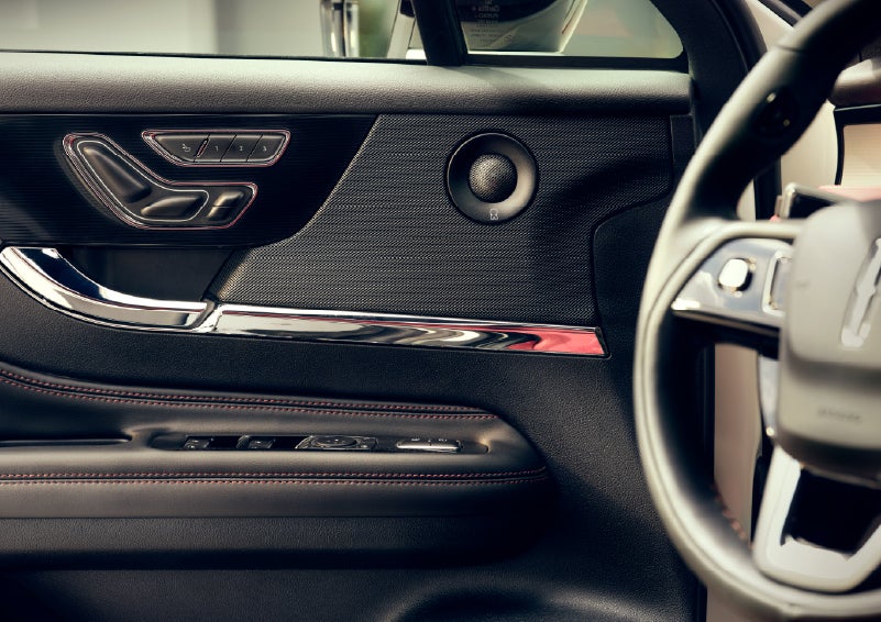 An audio speaker is shown in the driver's side door of a 2026 Lincoln Corsair® SUV | Dave Sinclair Lincoln St. Peters in Saint Peters MO