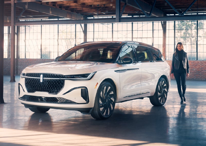 A person approaches a 2026 Lincoln Nautilus® SUV. | Dave Sinclair Lincoln St. Peters in Saint Peters MO