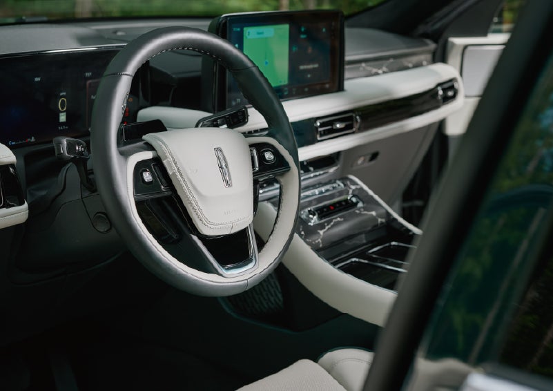 The leather-trimmed steering wheel of a 2027 Lincoln Aviator® Black Label™ SUV. | Dave Sinclair Lincoln St. Peters in Saint Peters MO